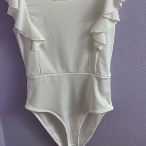 NEVER USED BODY SUIT!!!